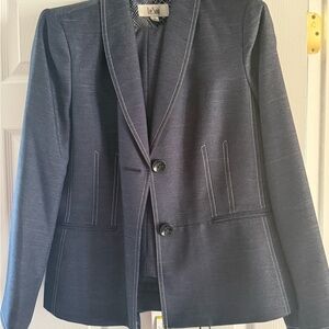 Navy blue with white piping women’s pantsuit.  Size 14. Brand new!